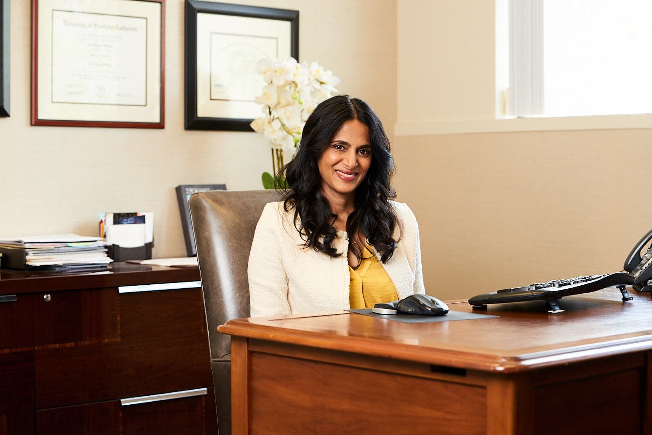 Dr. Taz Varkey, board-certified OB/GYN